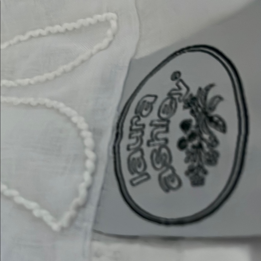 Laura Ashley White Embroidered curtains semi sheer (4) sets of 2. Beautiful.